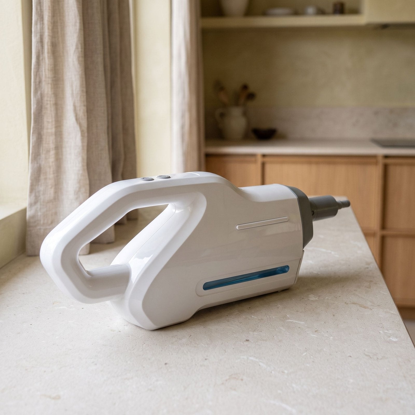 Handheld steamer resting on a counter beside a window in an illustrative setting