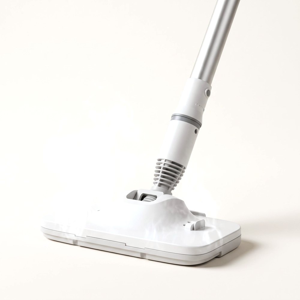 Close-up of the mop head with visible steam around it